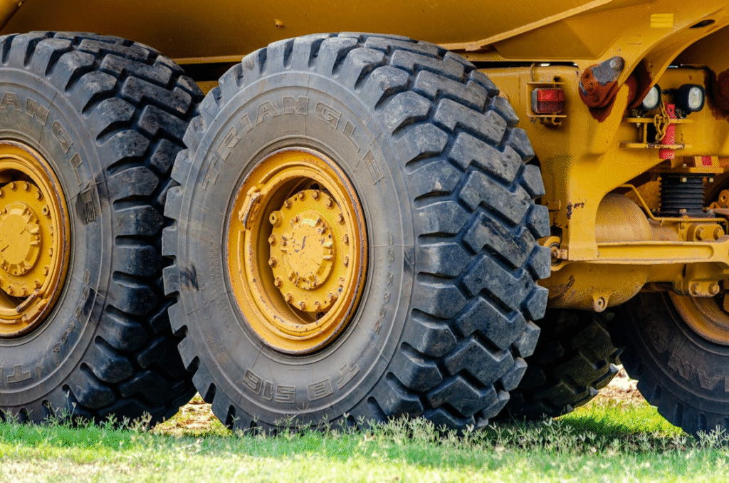close-up of an 18-wheeler's tires on grass