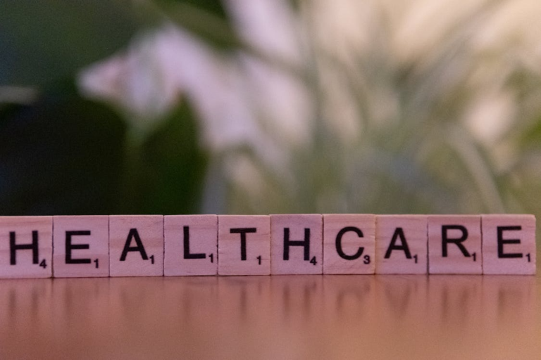 Scrabble tiles spelling “healthcare.”