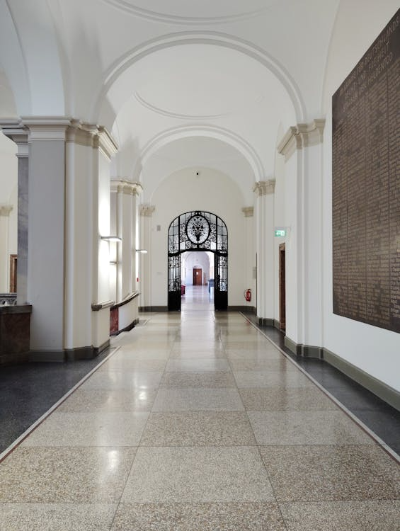 Courthouse interior hallway with arched ceiling and polished tiled floor