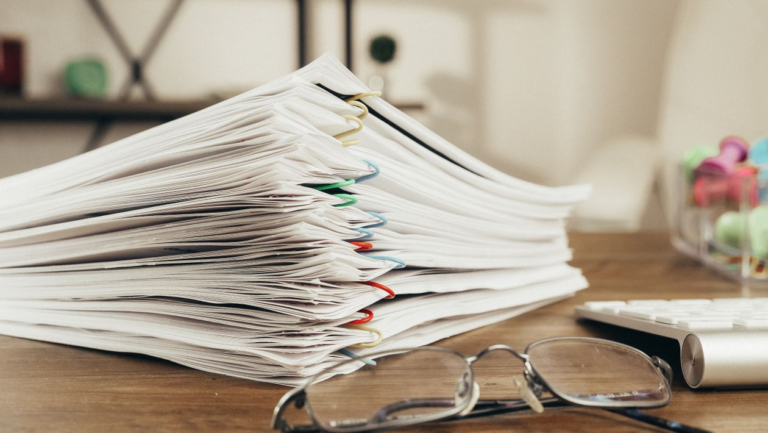 A pile of a clipped documents