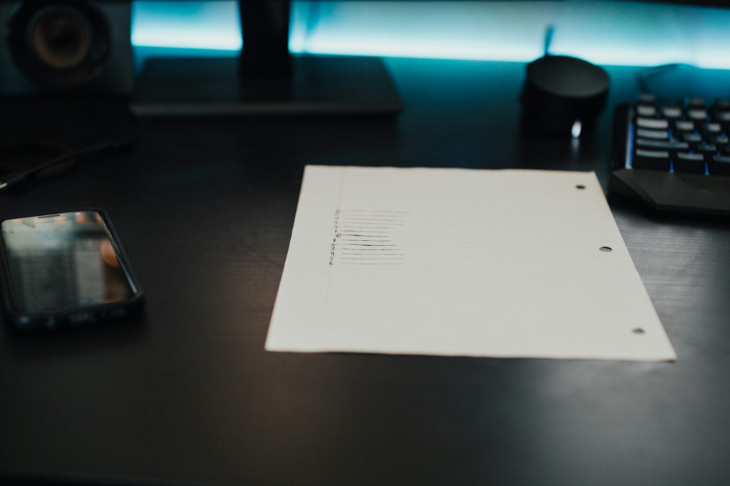 A stack of white printer paper
