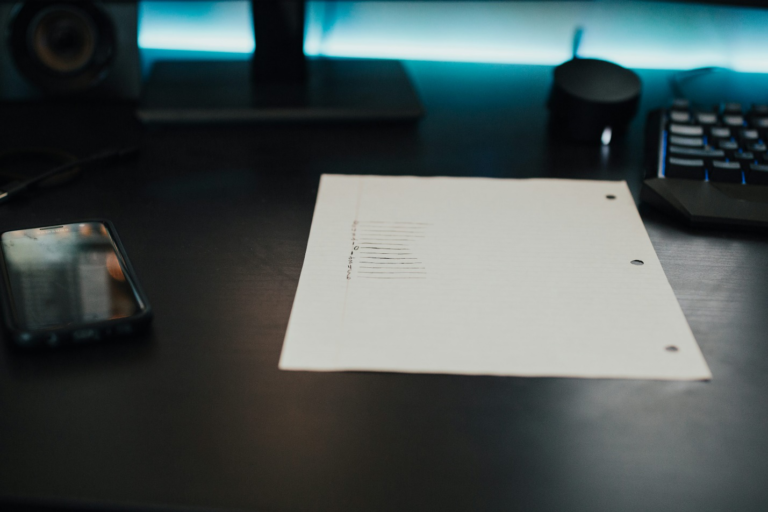 A stack of white printer paper