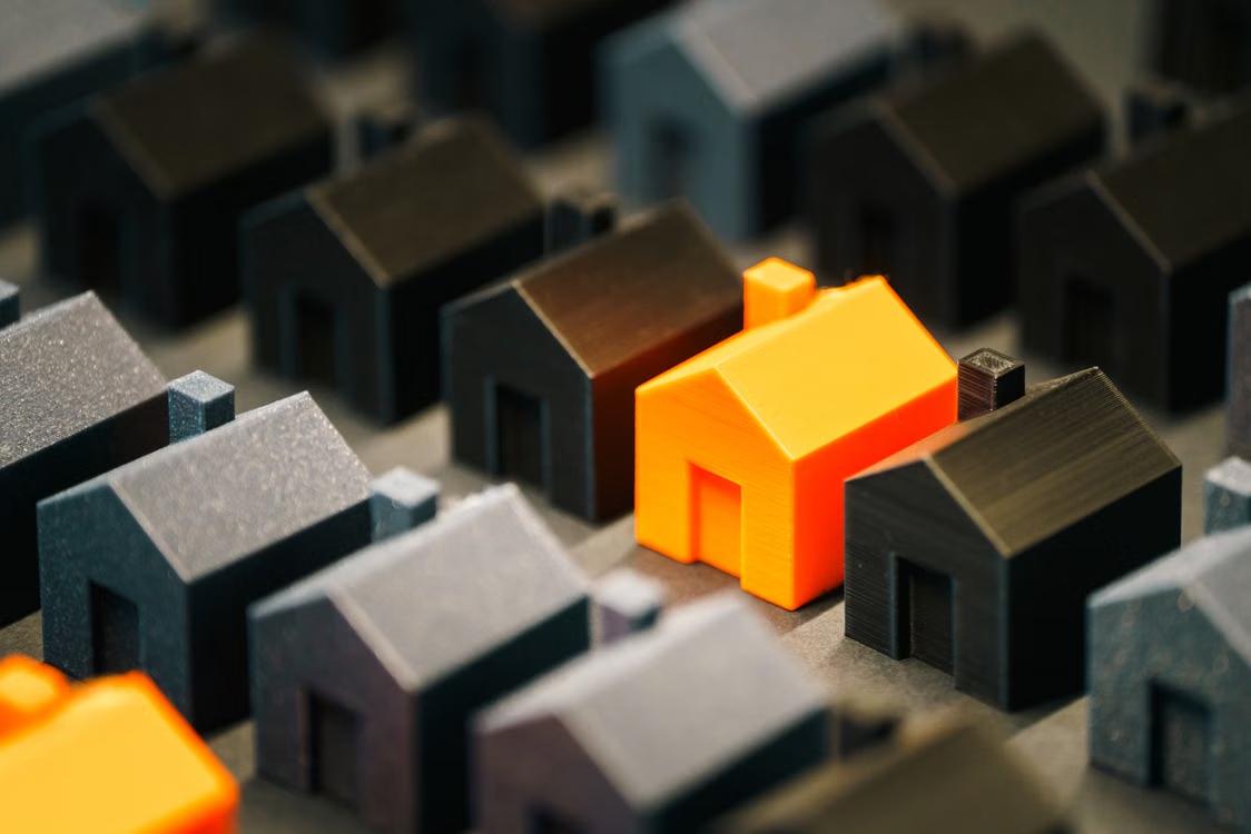 An image of miniature wooden houses