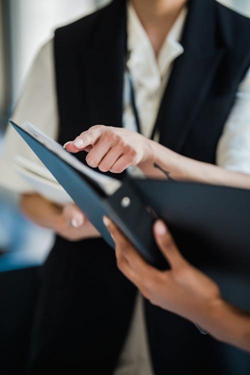 An image of a person looking at a document